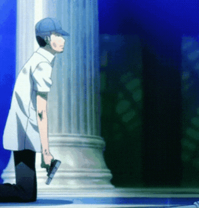 A Man In A Blue Hat Is Kneeling Down Holding A Gun GIF