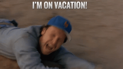 A Man In A Blue Hat Is Laying On The Ground With The Words I 'M On Vacation Written Above Him GIF