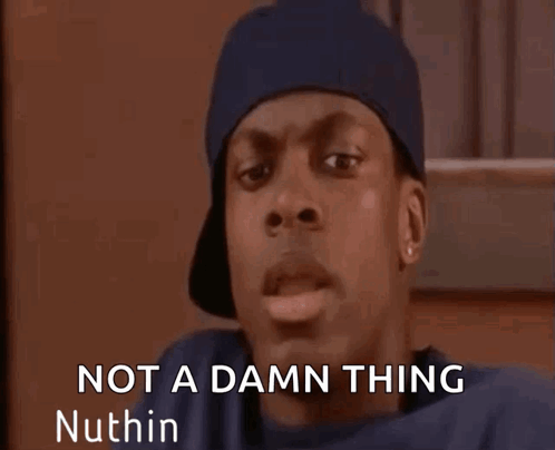 A Man In A Blue Hat Is Making A Funny Face And Saying Not A Damn Thing Nuthin . GIF