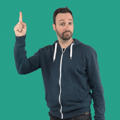 A Man In A Blue Hoodie Holds Up His Finger GIF