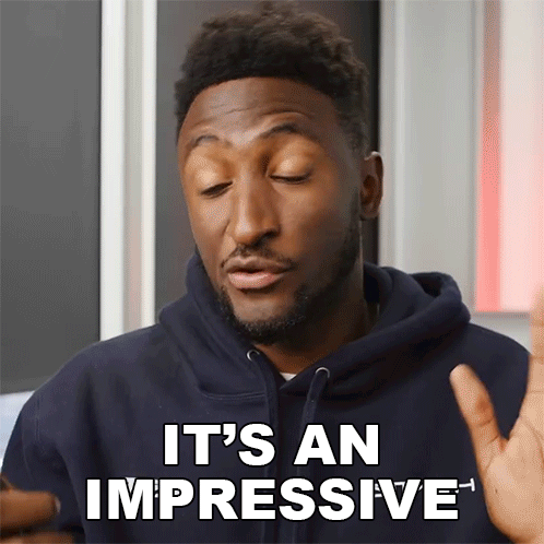 A Man In A Blue Hoodie Is Saying It 'S An Impressive GIF