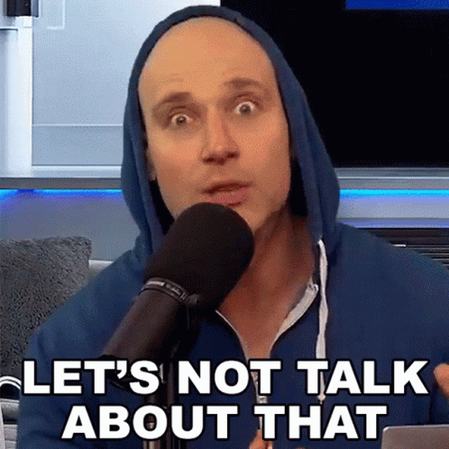 A Man In A Blue Hoodie Is Speaking Into A Microphone And Says Let 'S Not Talk About That GIF