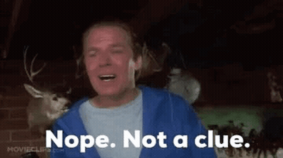 A Man In A Blue Hoodie Is Standing In Front Of A Deer Head And Says Nope . Not A Clue GIF