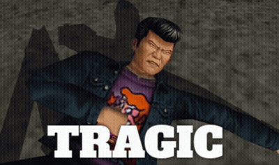 A Man In A Blue Jacket And A Purple Shirt With The Word Tragic On It GIF