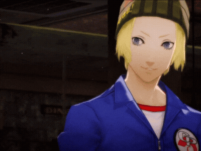A Man In A Blue Jacket Holding A Cell Phone With The Letter R On It GIF