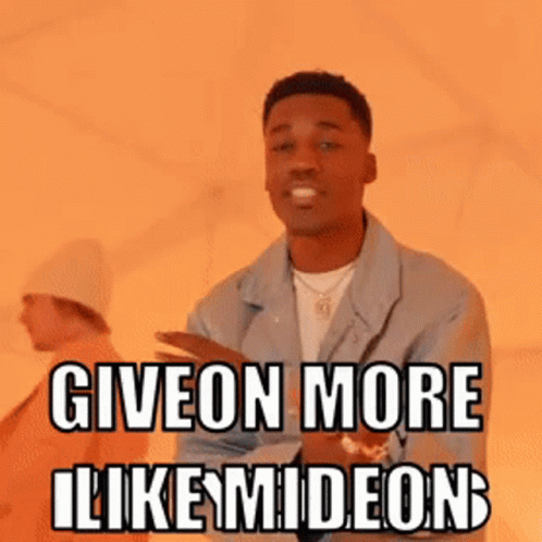 A Man In A Blue Jacket Is Giving A Thumbs Up And Says Give On More Likemideon GIF