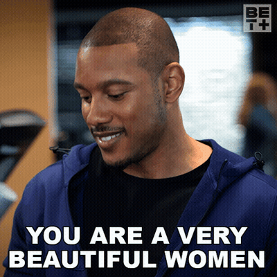 A Man In A Blue Jacket Is Smiling And Says You Are A Very Beautiful Women GIF