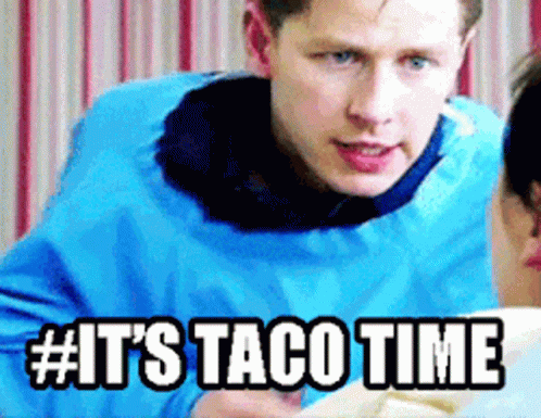 A Man In A Blue Jacket Says It 'S Taco Time While Talking To A Woman GIF