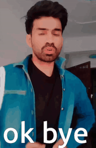 A Man In A Blue Jacket Says Ok Bye In White Letters GIF