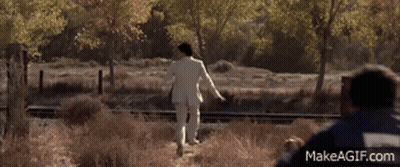 A Man In A Blue Jacket With Makeagif.com On The Bottom Left GIF