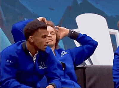 A Man In A Blue Jacket With The Word Europa On The Front GIF