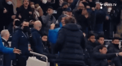A Man In A Blue Jacket With The Word Spurs On The Bottom Left GIF