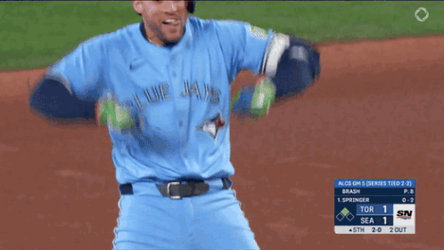 A Man In A Blue Jays Jersey Stands On The Field GIF