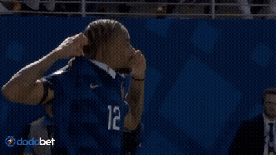A Man In A Blue Jersey With The Number 12 On It GIF