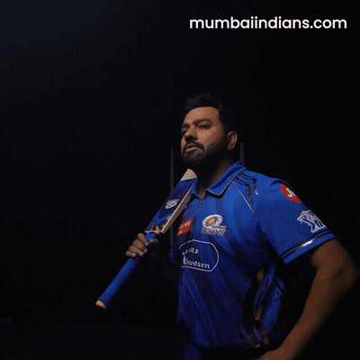 A Man In A Blue Mumbai Indians Shirt Holds A Cricket Bat GIF