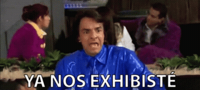 A Man In A Blue Shirt And Tie Is Making A Funny Face And Says Ya Nos Exhibiste GIF