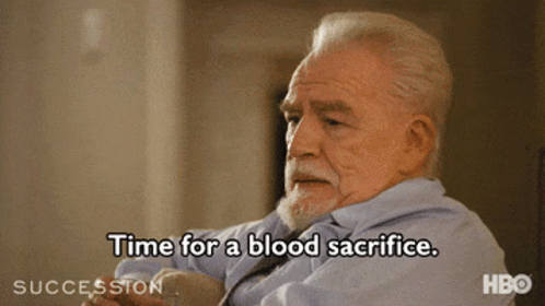A Man In A Blue Shirt And Tie Is Saying Time For A Blood Sacrifice GIF