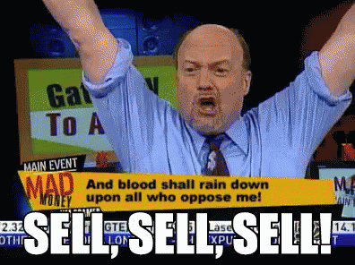 A Man In A Blue Shirt And Tie Is Screaming In Front Of A Sign That Says Mad Money GIF