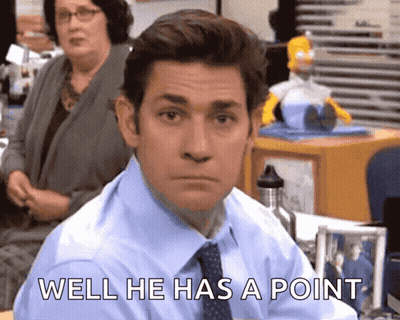 A Man In A Blue Shirt And Tie Says Well He Has A Point In Front Of Him GIF