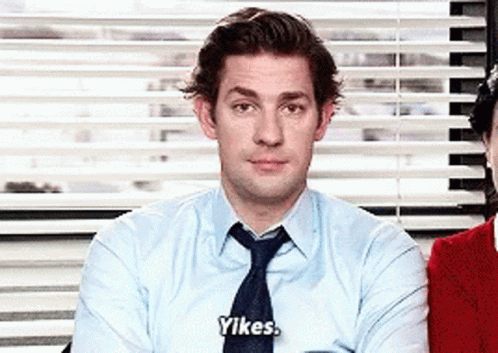 A Man In A Blue Shirt And Tie Says Yikes . GIF