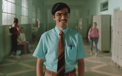 A Man In A Blue Shirt And Tie With A Pen In His Pocket GIF