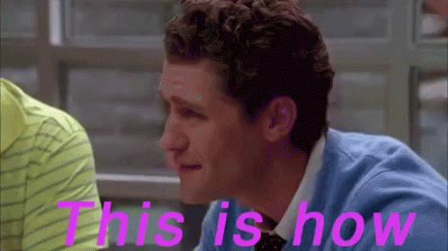 A Man In A Blue Shirt And Tie With The Words This Is How Behind Him GIF