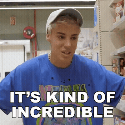 A Man In A Blue Shirt And White Hat Says It 'S Kind Of Incredible . GIF