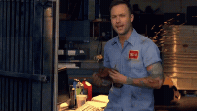 A Man In A Blue Shirt Has A Name Tag That Says Dale Jr. GIF