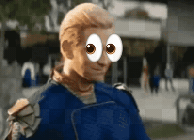 A Man In A Blue Shirt Has Cartoon Eyes GIF