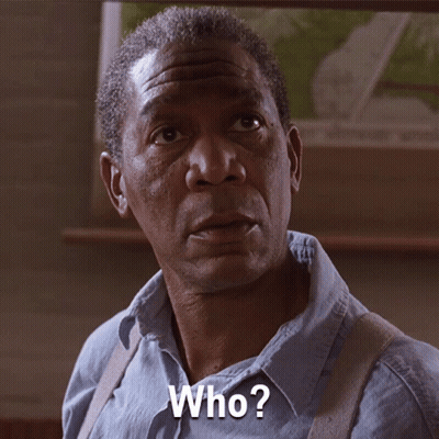A Man In A Blue Shirt Is Asking The Question Who GIF