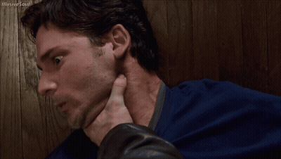 A Man In A Blue Shirt Is Being Choked By Someone With Illusive Soul Written On The Bottom GIF