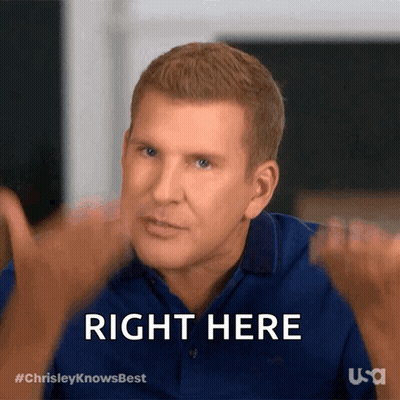 A Man In A Blue Shirt Is Giving A Thumbs Up With The Words Right Here Below Him GIF
