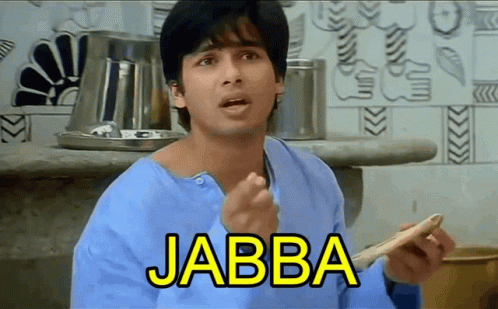 A Man In A Blue Shirt Is Holding A Piece Of Bread With The Word Jabba Written On It GIF
