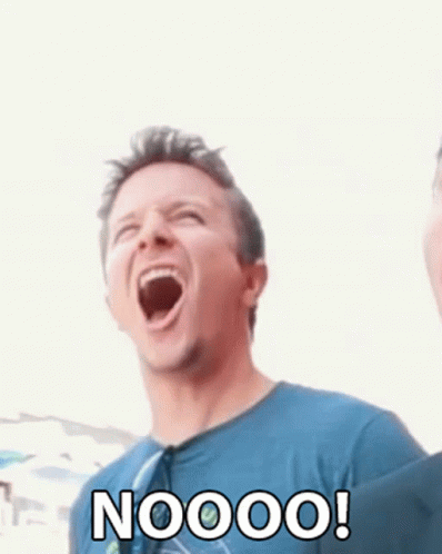A Man In A Blue Shirt Is Laughing With The Words Noooo Written On His Face GIF