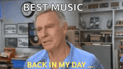 A Man In A Blue Shirt Is Making A Funny Face And Says `` Best Music Back In My Day ... '' GIF