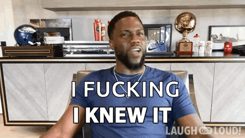 A Man In A Blue Shirt Is Sitting In A Chair And Says " I Fucking Knew It " GIF