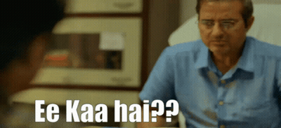 A Man In A Blue Shirt Is Sitting In A Hospital Bed And Says Ee Kaa Hai GIF