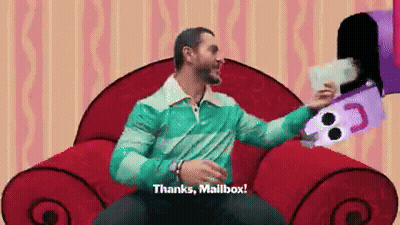 A Man In A Blue Shirt Is Sitting In A Red Chair And Saying " Thanks Mailbox " GIF