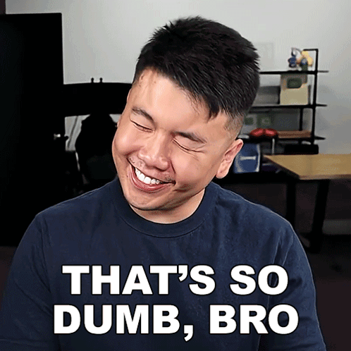 A Man In A Blue Shirt Is Smiling With The Words That 'S So Dumb Bro Below Him GIF