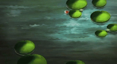 A Man In A Blue Shirt Is Standing In A Body Of Water Surrounded By Green Lily Pads GIF