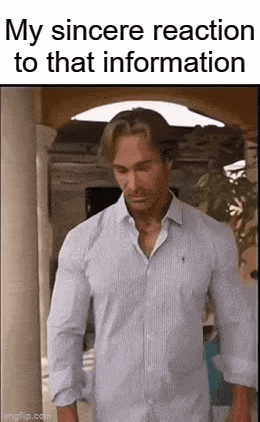 A Man In A Blue Shirt Is Standing In A Doorway With His Arms Crossed . GIF