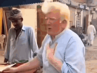 A Man In A Blue Shirt Is Standing In Front Of A Man In A Blue Shirt . GIF