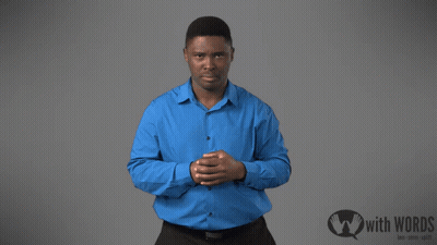 A Man In A Blue Shirt Is Standing In Front Of A Sign That Says With Words GIF