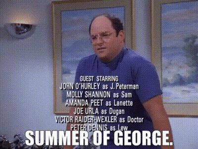 A Man In A Blue Shirt Is Standing In Front Of A Wall With A Caption That Says Summer Of George GIF