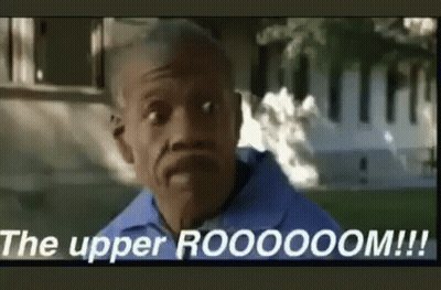 A Man In A Blue Shirt Is Standing In Front Of A White House And Says `` The Upper Rooooom ! '' GIF