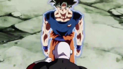 A Man In A Blue Shirt Is Standing Next To A Man In A Black Suit . GIF
