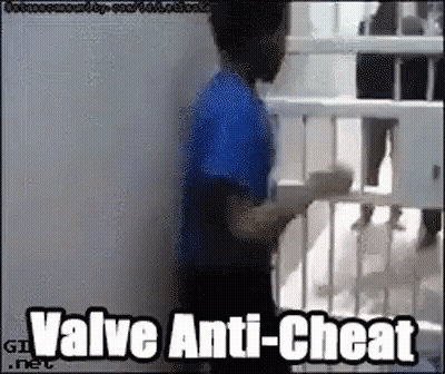A Man In A Blue Shirt Is Standing Next To A Railing With The Words Valve Anti-Cheat On The Bottom GIF