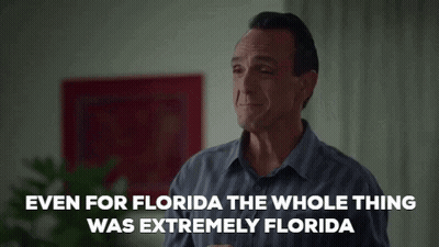 A Man In A Blue Shirt Is Talking About Florida And Crying . GIF