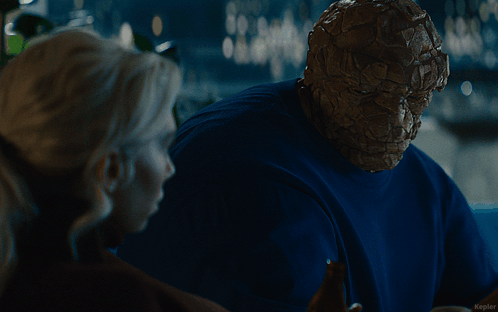 A Man In A Blue Shirt Is Talking To A Woman With The Caption Kepler GIF