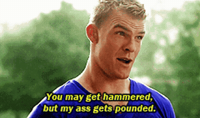 A Man In A Blue Shirt Is Talking To Another Man . GIF